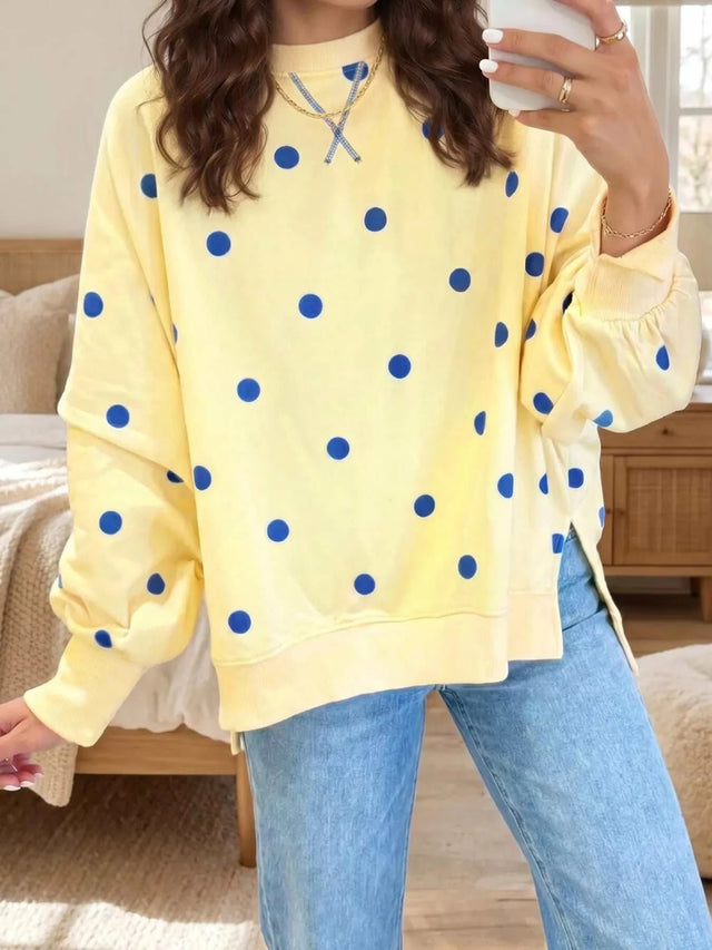 Side Slit Polka Dot sweatshirt in pale yellow with blue dots, oversized fit, gathered cuffs and split hem.